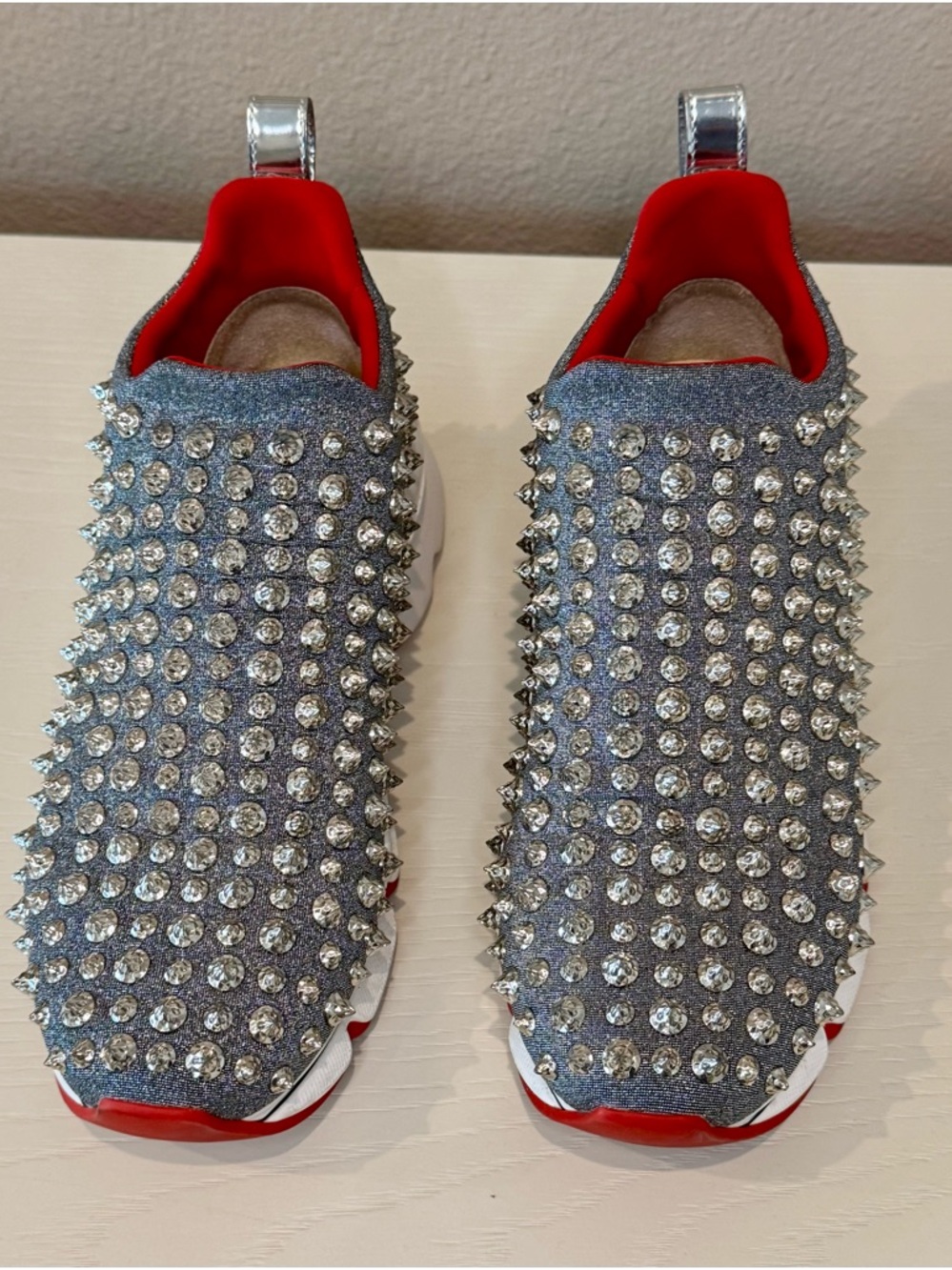 Christian Louboutin Silver Crystal-Studded Slip-On Sneakers with Red Interior